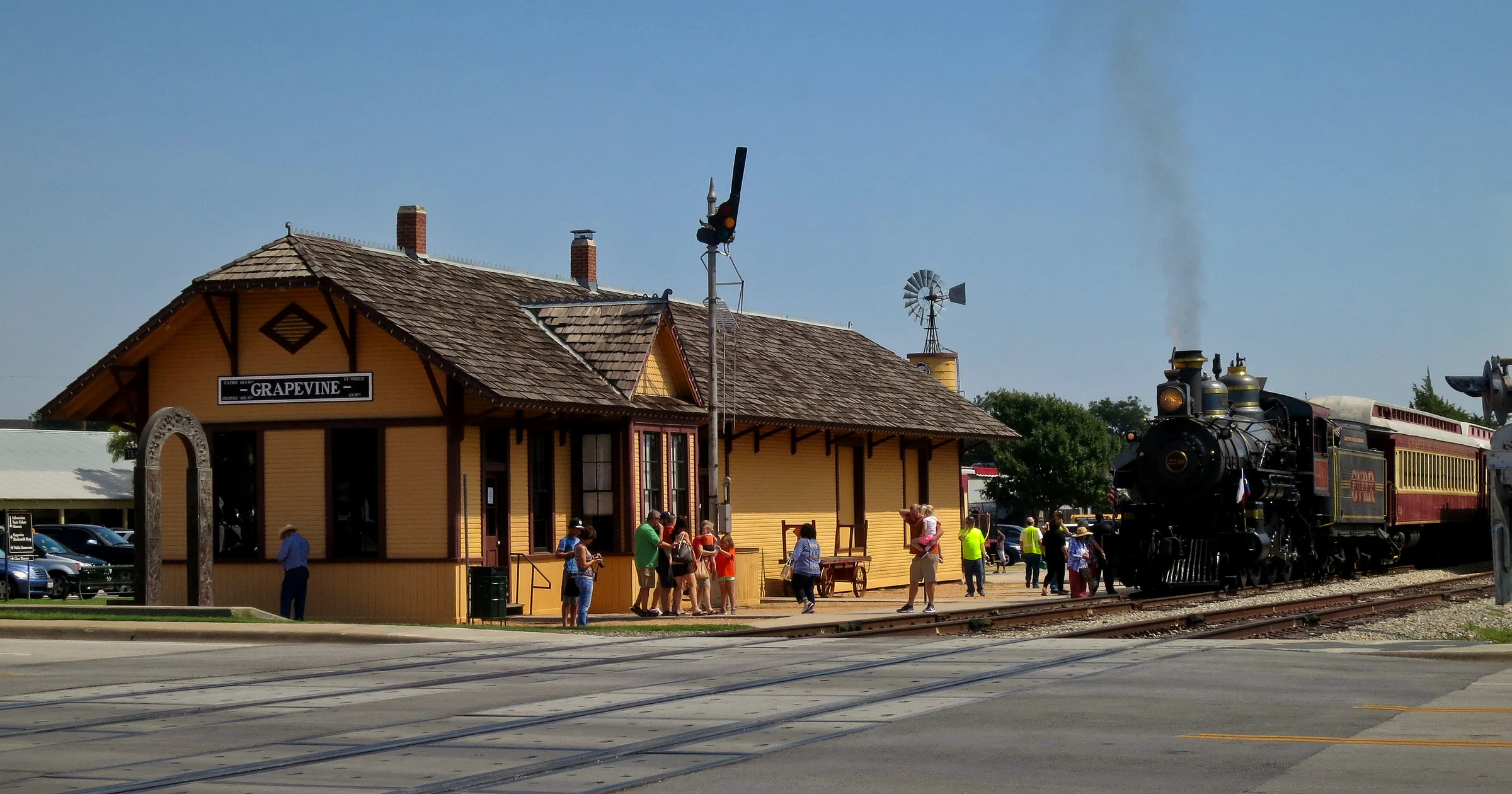 Grapevine Vintage Railroad steam train beside the historic Cotton Belt depot in Grapevine, Texas